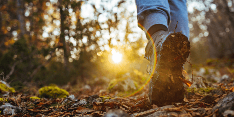 A boot walking through the mud
