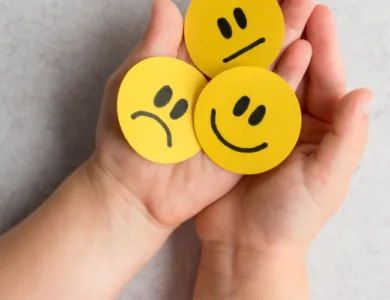 Paper rounds of different emotion faces