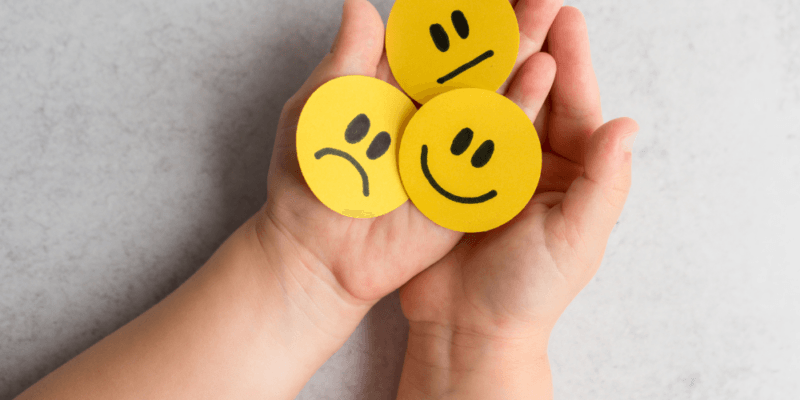 Paper rounds of different emotion faces